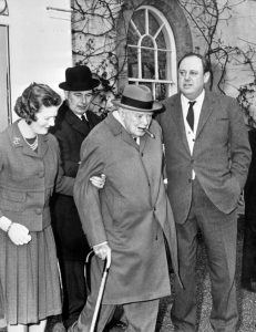 Mary Soames, Edmund Murray, and Christopher Soames lend a helping hand