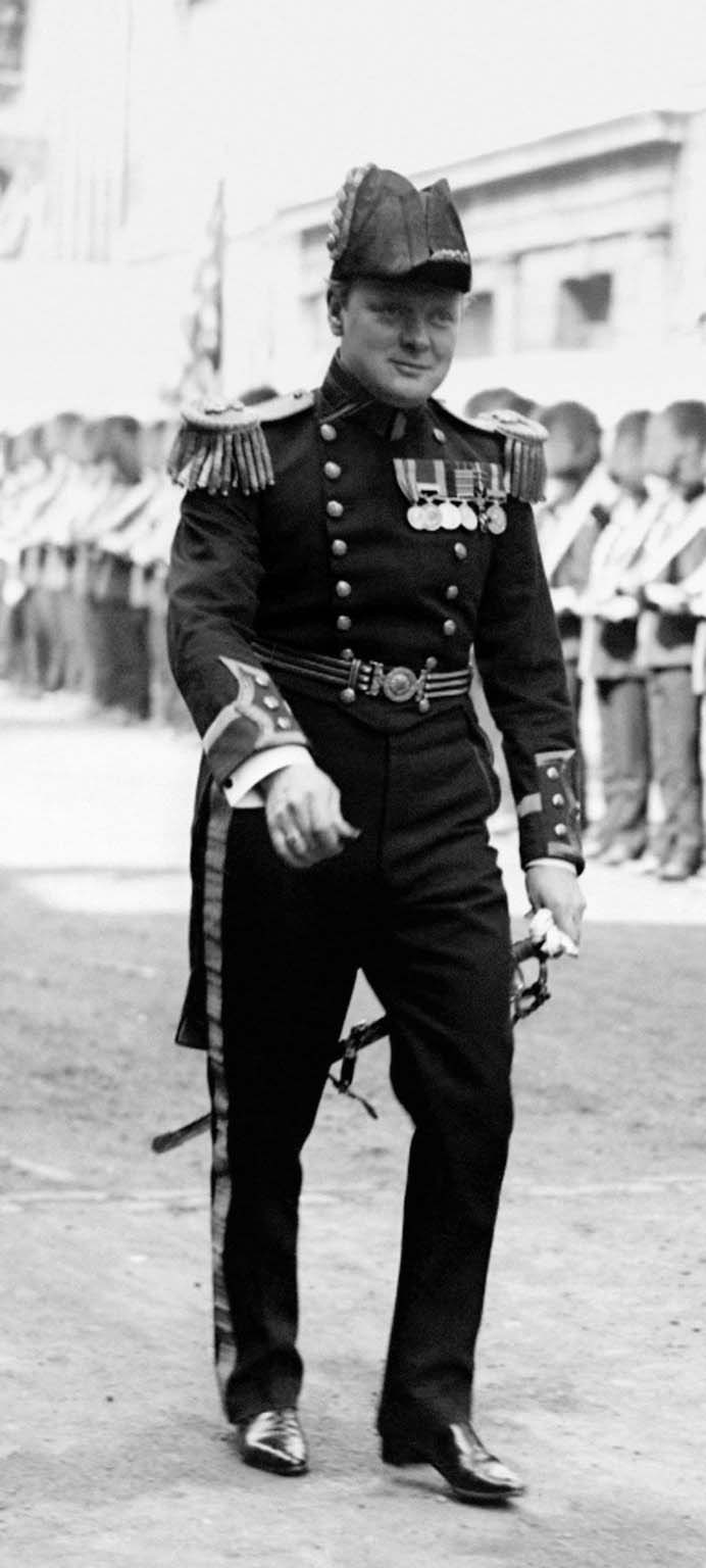 First Lord of the Admiralty Winston Churchill, in uniform, leaving the Guildhall during the visit of the French President. (The uniform is that of the Elder Brother of Trinity House). First Lord of the Admiralty Winston Churchill